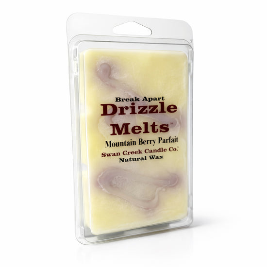 Packaged wax melt with 'Drizzle Melts' branding on a white background